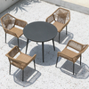 Mesa y sillas de ratán tejida de patio al aire libre